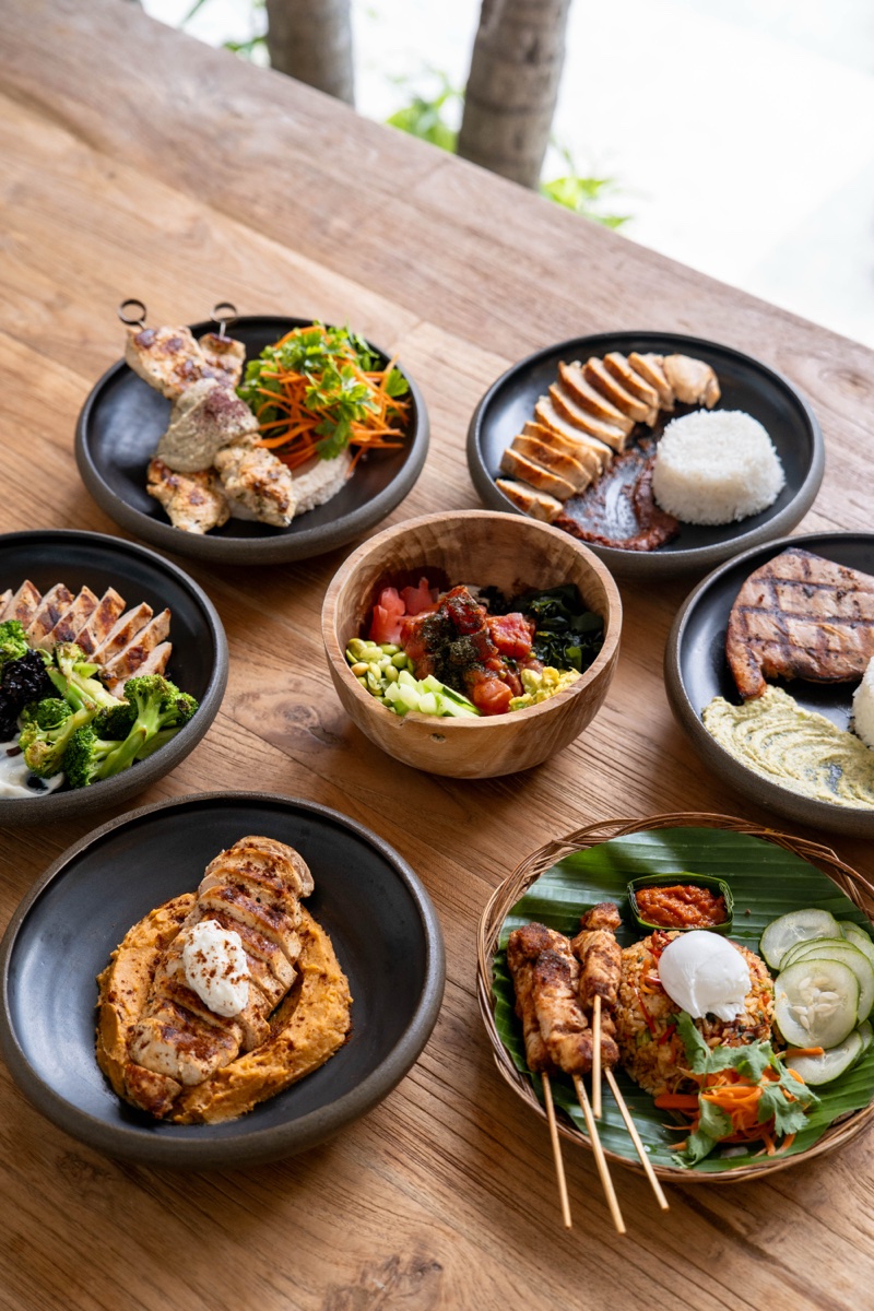 A spread of mains and bowls from the Mowie's kitchen